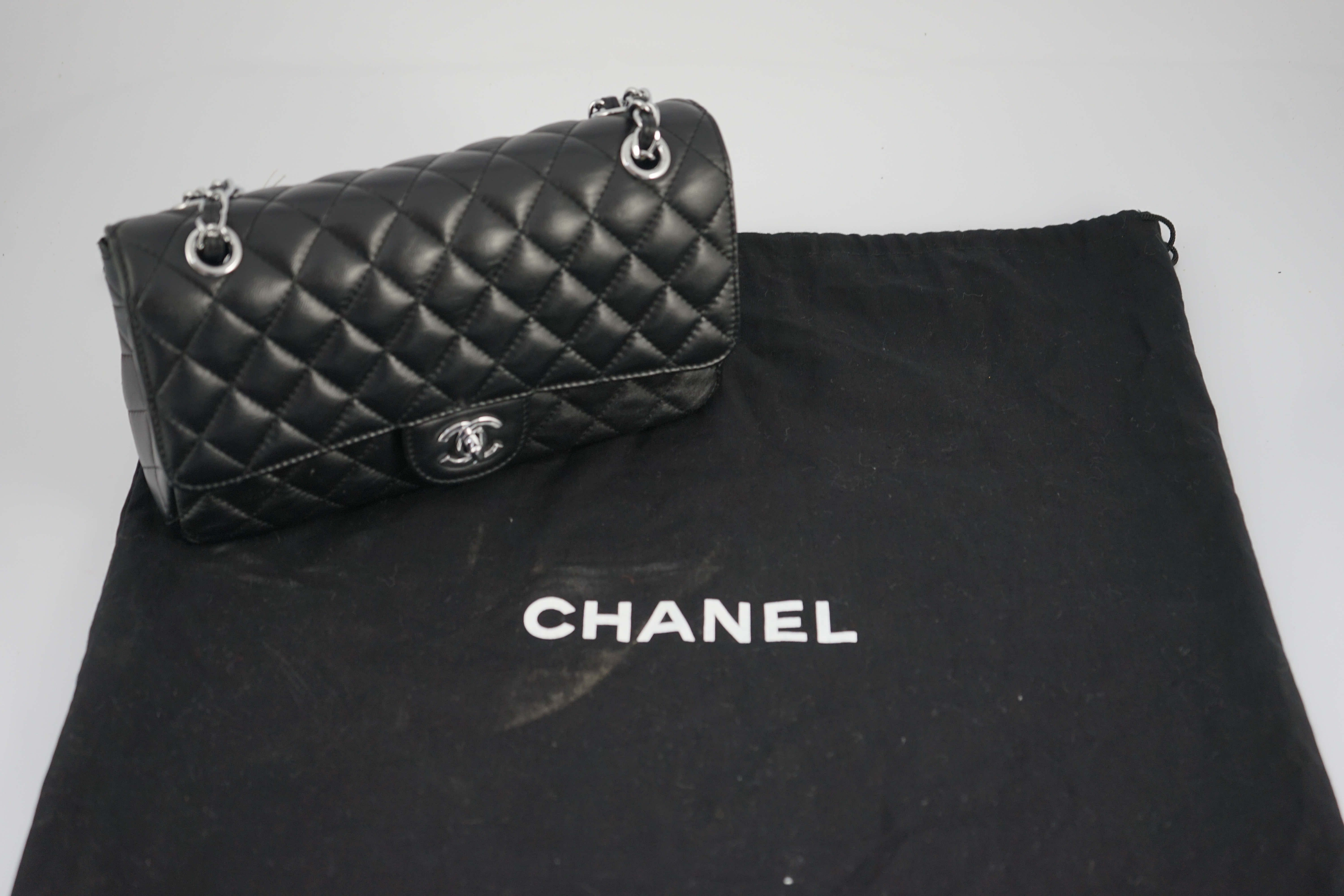 A Chanel classic black quilted leather shoulder bag width 25.5cm, depth 7cm, height 16cm